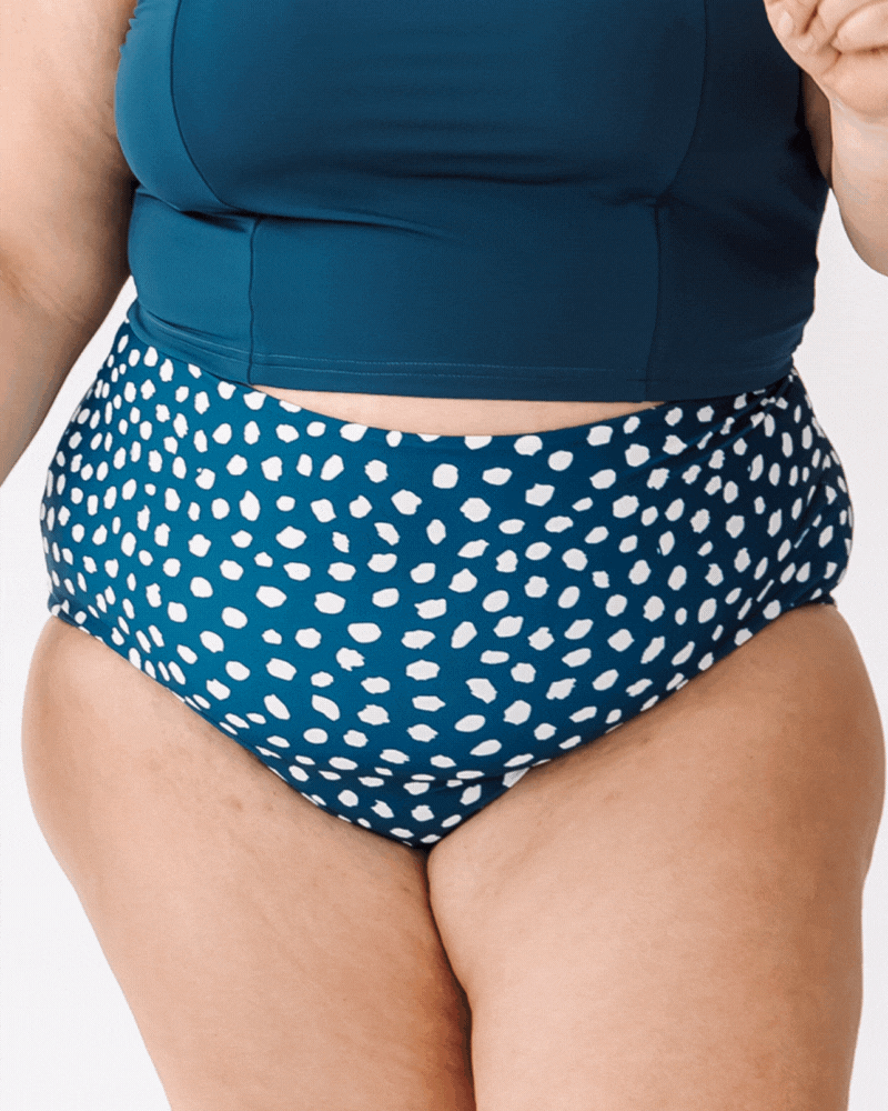 Video of a woman wearing Indigo dot/Indigo reversible high-waist bottoms