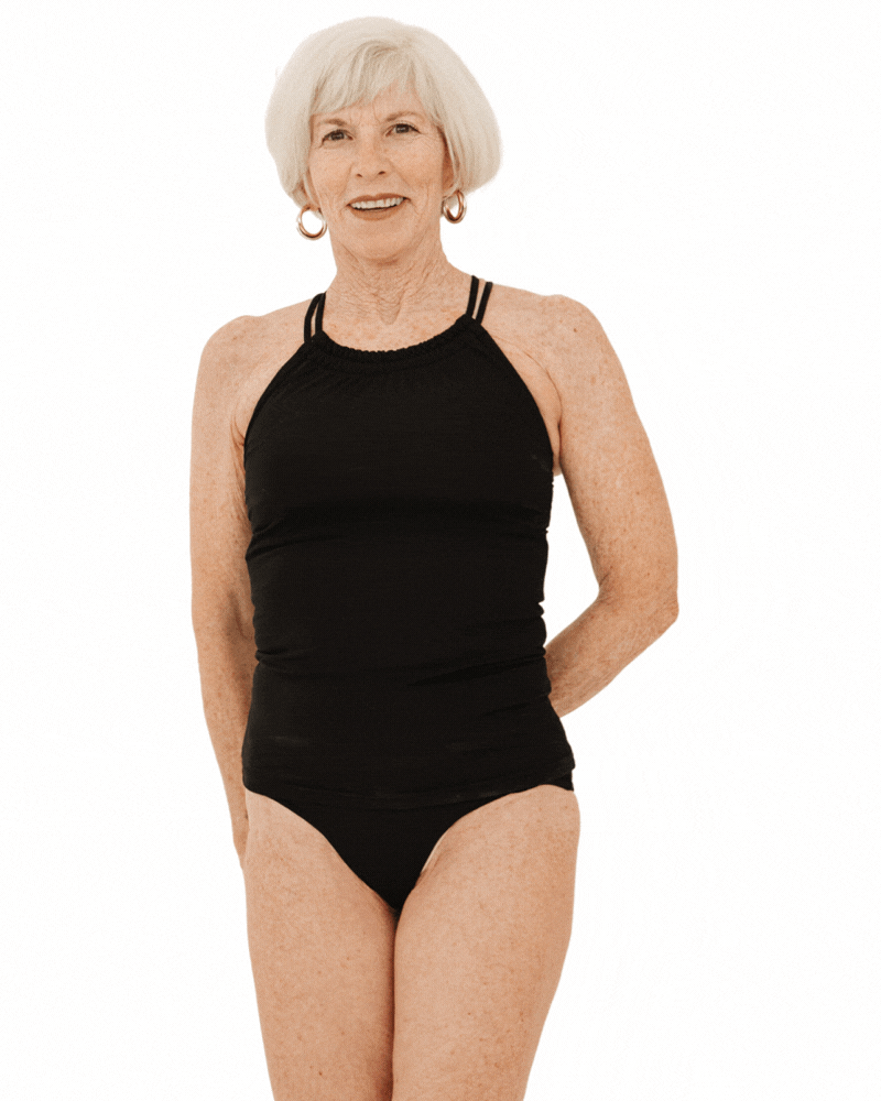 GIF of a woman wearing a black double cinch swim tankini top