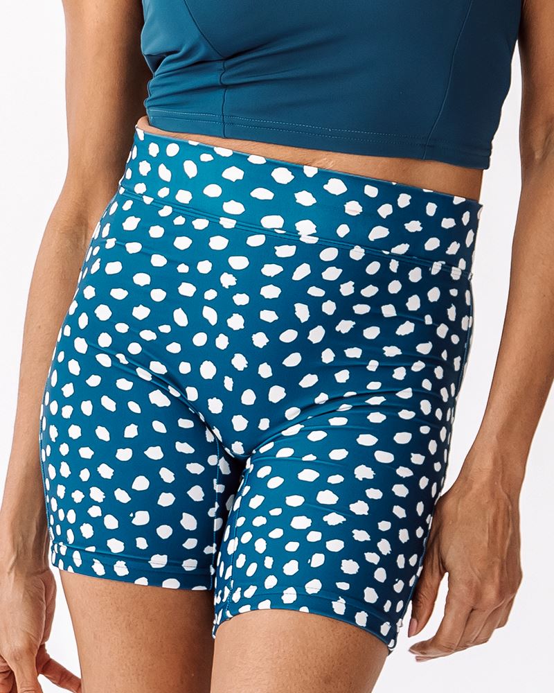 Photo of a woman wearing an Indigo dot Swim bike short