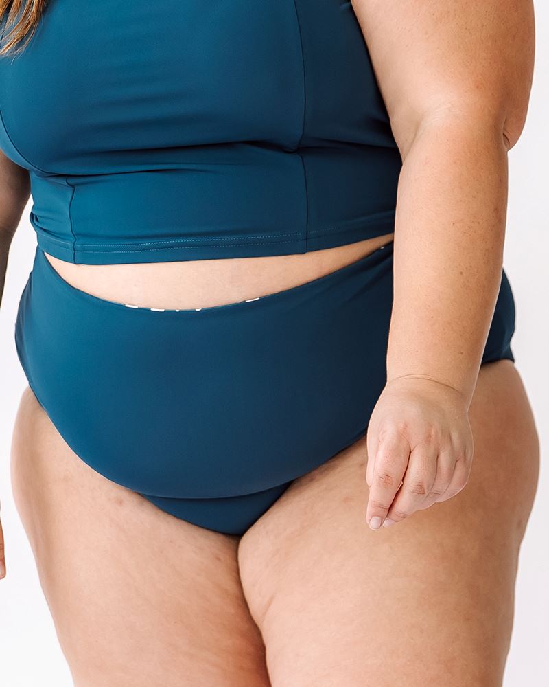 Photo of a woman wearing Indigo reversible high-waist bottoms