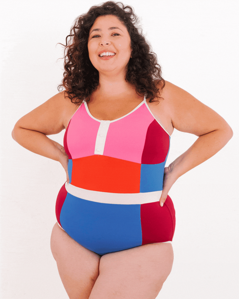 GIF of a woman wearing a Color Block one-piece swim suit