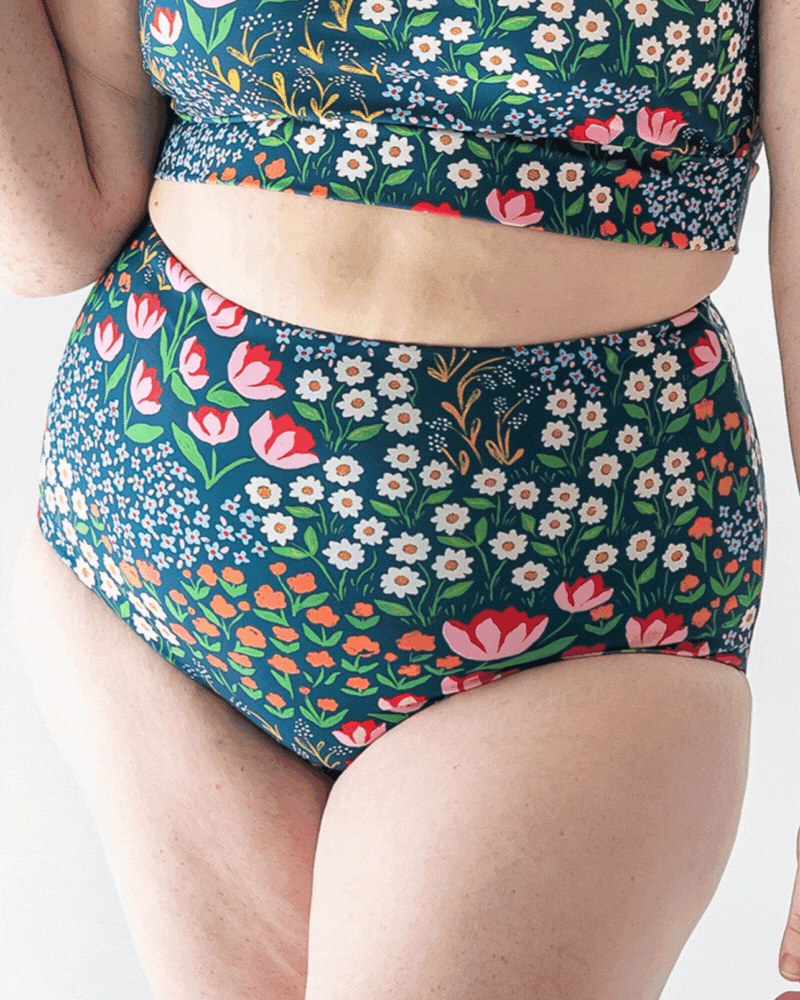GIF of a woman wearing a Blixen/Indigo reversible swim bottom