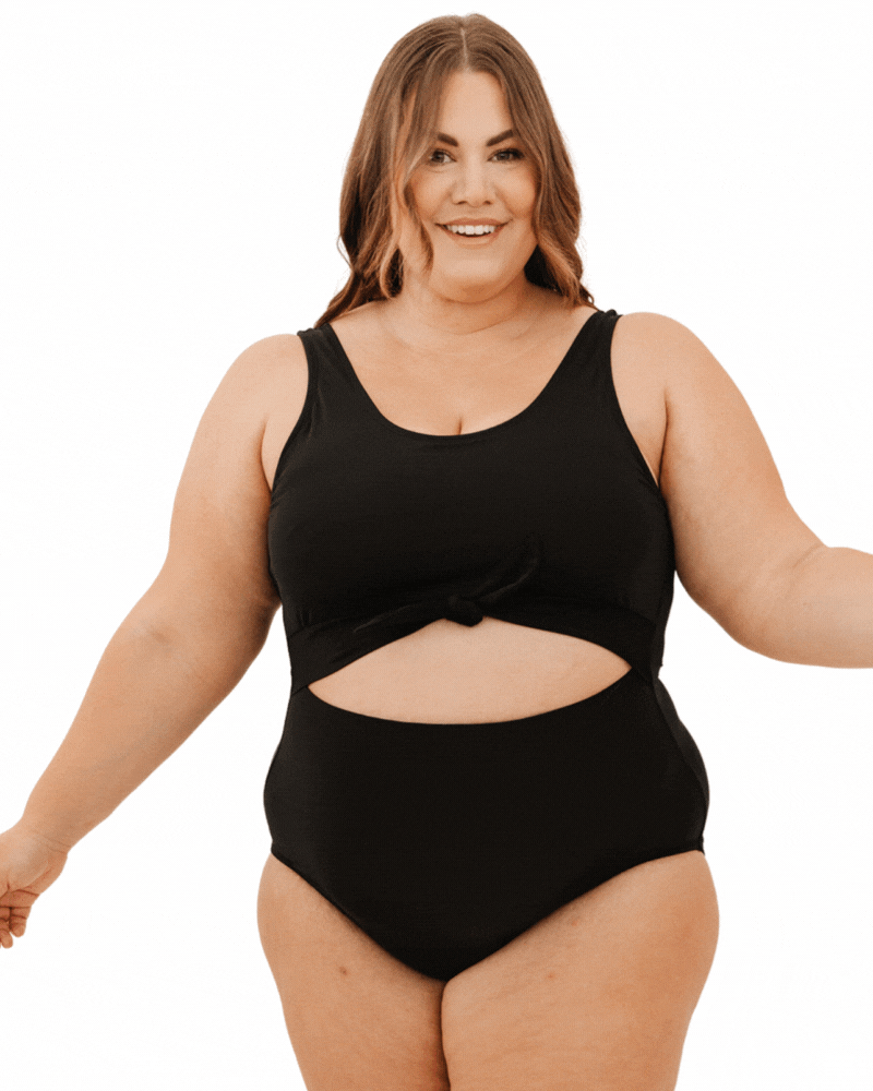 GIF of a woman wearing a black knotted one-piece swim suit