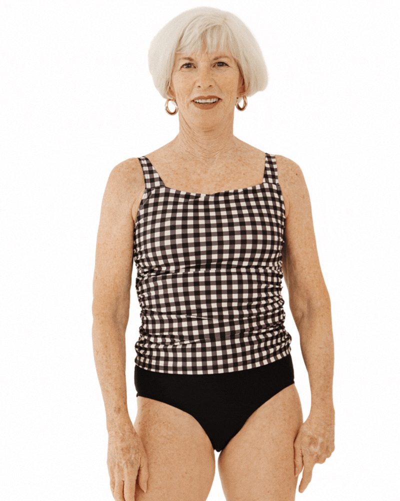GIF of a woman wearing a black gingham square neck tankini swim top with black bottoms