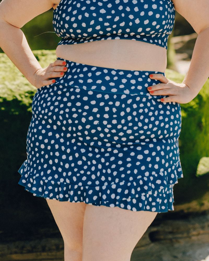 Photo of a woman wearing Indigo dot swim skirt