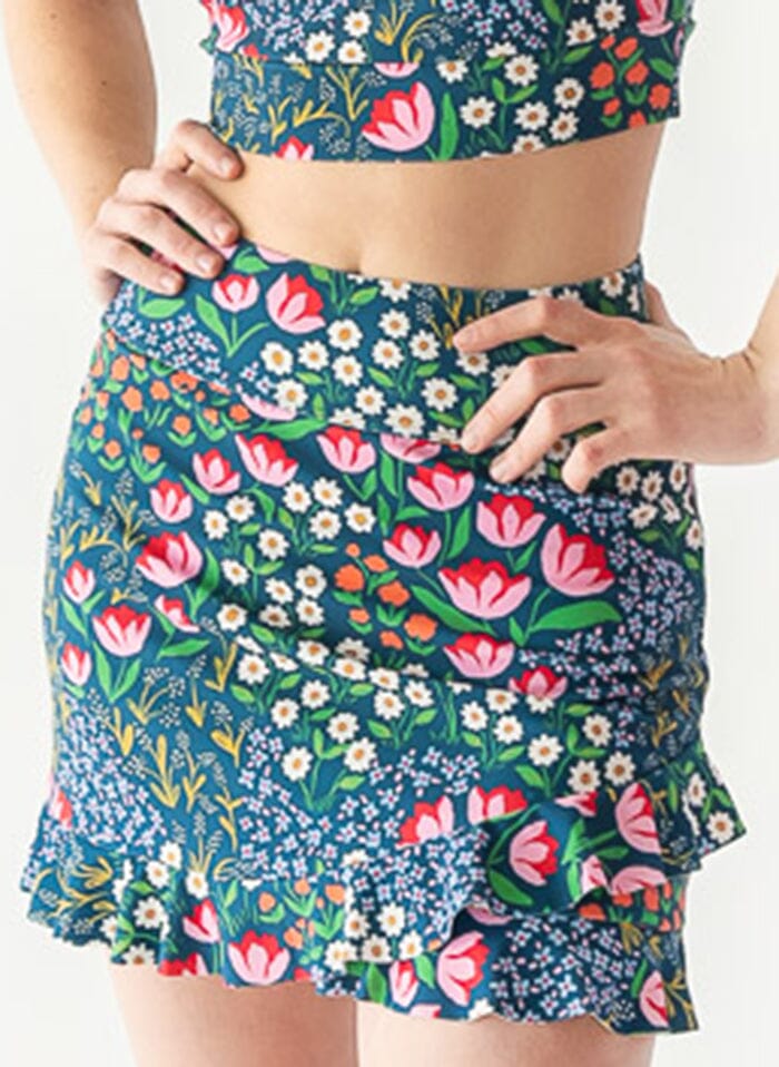 Photo of a woman wearing a Blixen swim skirt bottom