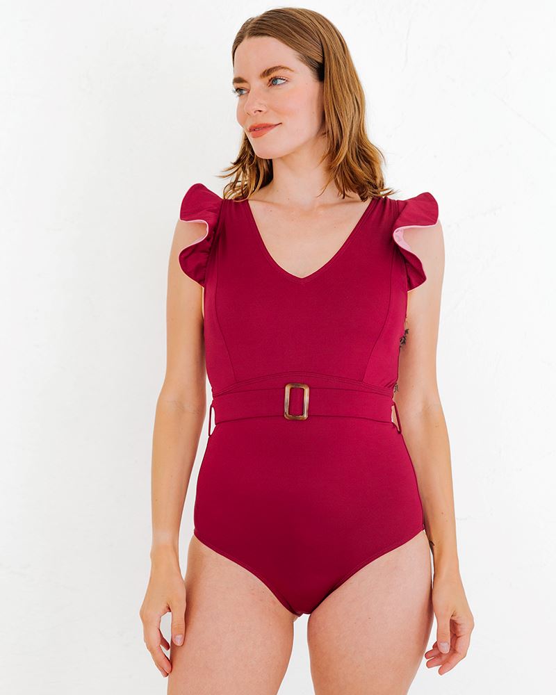 Photo of a woman wearing a Burgundy Ruffle one-piece swim suit