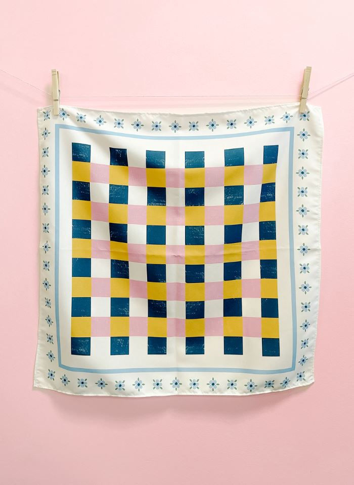 Photo of blue, yellow, white, and pink checkered bandana